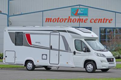 Burstner Lyseo T734|Lyseo T734 2 Berth|Burstner Lyseo T734|Lounge in Ferra Arc leather|Entrance|L Lounge with skylight|Rear Island bed|Ensuite bedroom|Island Bed|L Kitchen|Swivel pilot seats|Over cab|Washroom|