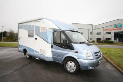 Laika 595C 2008|Laika 595C side profile|Laika 595C under 6 metres|Rear double bed|Kitchen|Large fridge freezer|Swivel Pilot seats and dinnig|Rear facing|Shower and washroom|Laika 595C front|