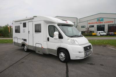 Burstner Solano t615|Solano t615|2007 Solano rear|Front to rear view|Dining area|Washroom|Rear of habitation|Low fixed bed|Captain swivel seats|Kitchen|